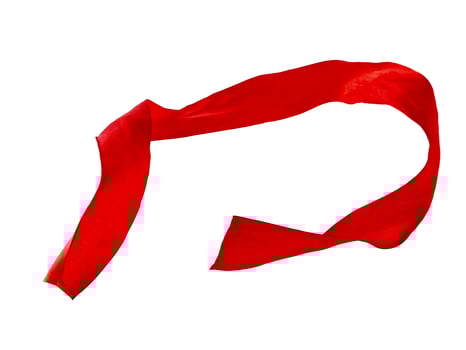 Levitation of red ribbon on white background photo