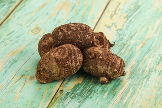 Coconut shell on a wooden table photo