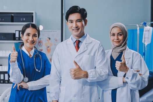 Asian doctor team with thumbs up photo
