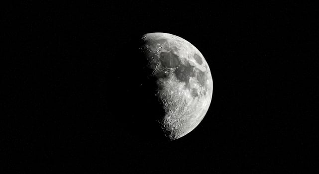 Gibbous moon in a starry sky for night themed designs and astronomy concepts, showcasing the beauty of celestial objects and nighttime. photo