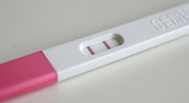 Positive Pregnancy Test Result Shows Two Lines Indicating Pregnancy Confirmation photo