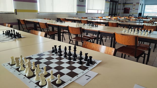 A chessboard with pieces a prepared for a tournament. Concept of chess competitions, tournaments, photo
