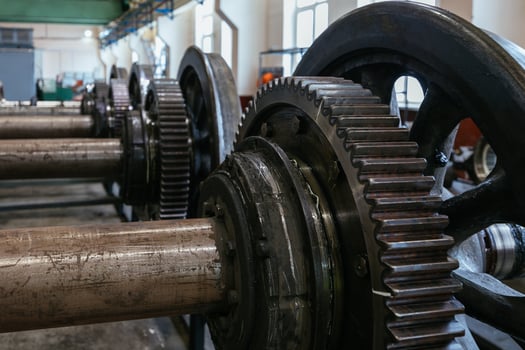 Steel train wheels at service in wagon repair workshop, close up photo