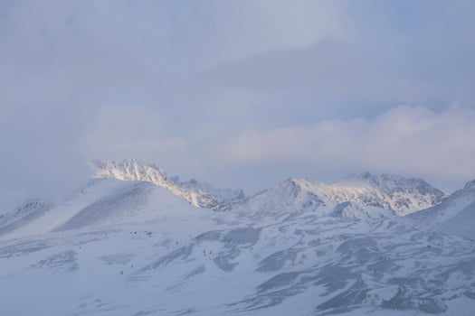 Minimalistic natural backdrop with mountains in winter. photo