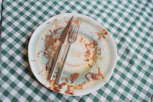 Delicious dessert enjoyed at a cozy restaurant table setting photo