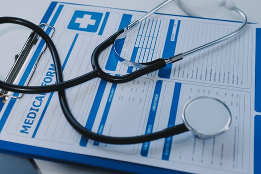 Medicine chart and stethoscope on clipboard photo