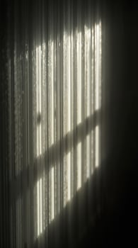 Window shadow on dark corrugated vertical metal texture. photo