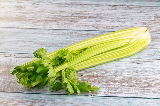 A celery root on a wooden table photo
