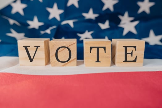 Wooden block with the word Vote written on it photo