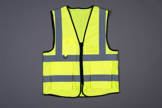 Green Safety Vest on a grey background photo