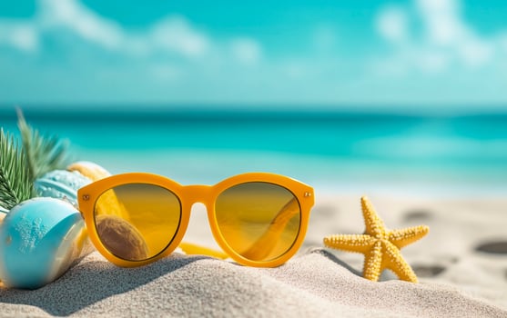 Tropical summer vacation concept. Beach, vibrant colors, flowers, cocktails and sunglasses still life concept for spring and summer sales. Sunglasses on the sand. photo