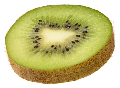 Slice kiwi fruit, isolated background. The vibrant green flesh with black seeds and fuzzy brown skin photo