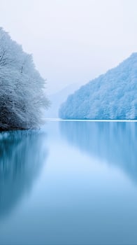 Tranquil Pink Glass River Flowing Through Winter Forest Landscape in Pastel Hues photo