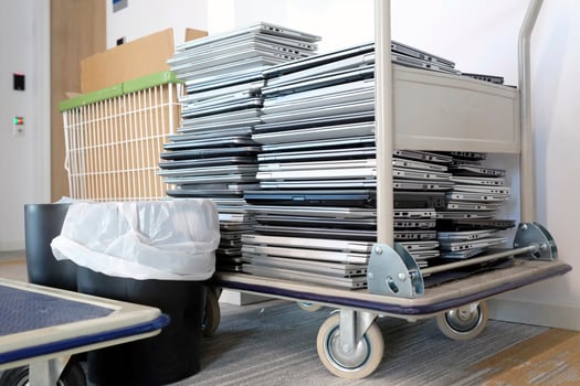 Electronic waste - stacked laptops to be discarded photo