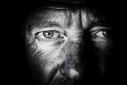 Black and white portrait of a man's face photo