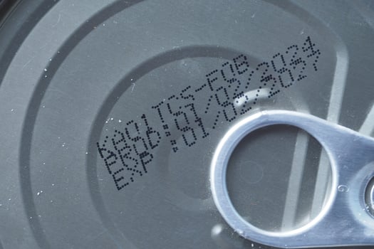 Understanding expiry date on a canned food product lid photo