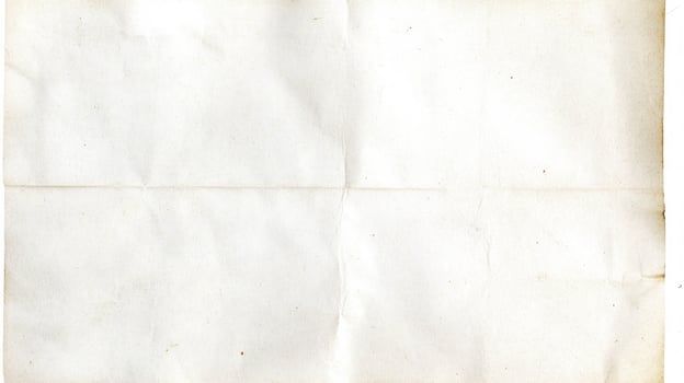 Yellow paper texture with vintage creasing for design projects photo