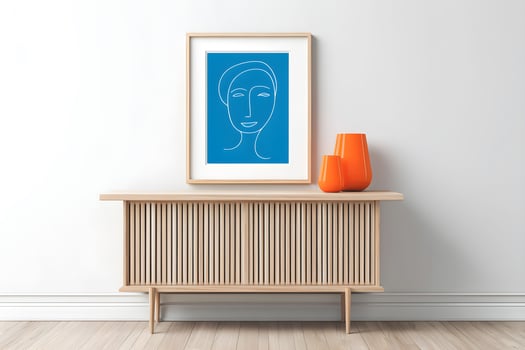 Modern interior design featuring minimalist artwork and decorative vases in a bright space with wooden furniture photo