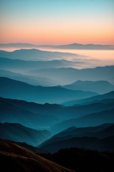 Serene twilight over layered mountain ranges photo
