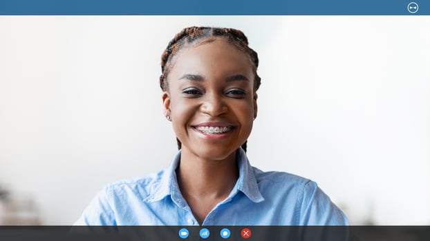 Remote Work. Happy young black female freelancer posing at home office, sitting at desk with laptop computer and smiling at camera, african american lady working online in internet, free space photo