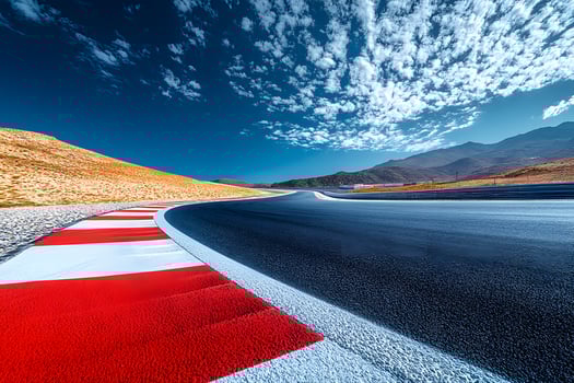 Scenic Desert Racetrack Under Blue Sky Ideal for Sports Photography and Design photo
