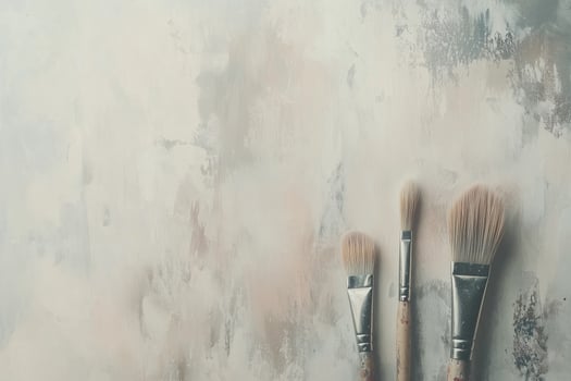 Paintbrushes and canvas arranged on a neutral background ready for creative expression and artistic exploration photo