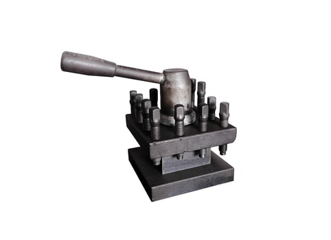 Quick change tool post of metal lathe, quick change tool isolated on white background with clipping path photo