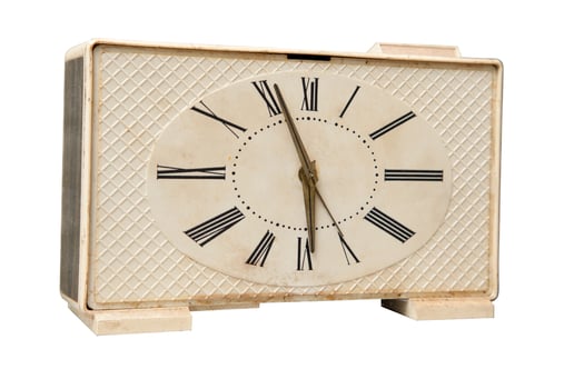 Old alarm clock, white background photo