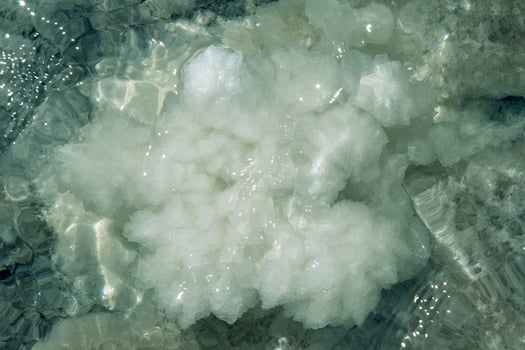 Raw salt cluster under water photo