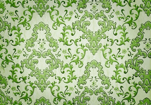 Old green wallpaper with vignette photo