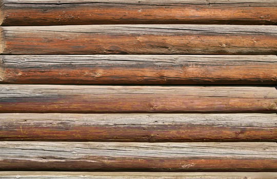 Log cabin wall background photo