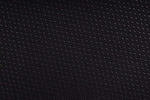 Dark Rubber Surface with Embossed Diamond Pattern photo