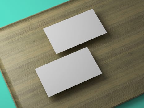 Diagonal composition of blank business cards on wood and teal combo background, ideal for creatives. photo