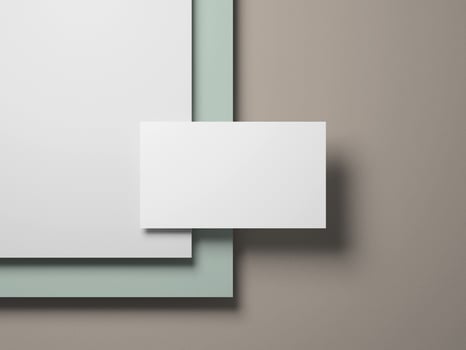 Elegant minimalist business card mockup with clean white card floating over soft green and beige layers. photo