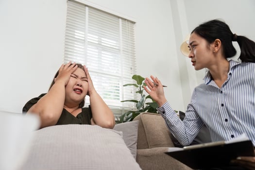 Therapy and Emotional Support. A psychiatrist guiding a distressed patient during a therapy session, providing guidance for mental health challenges. photo
