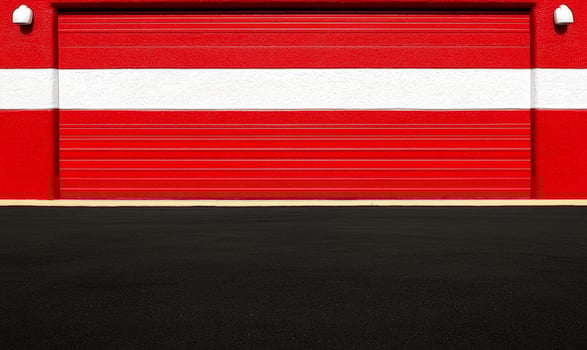 A garage door with a red stripe on it photo