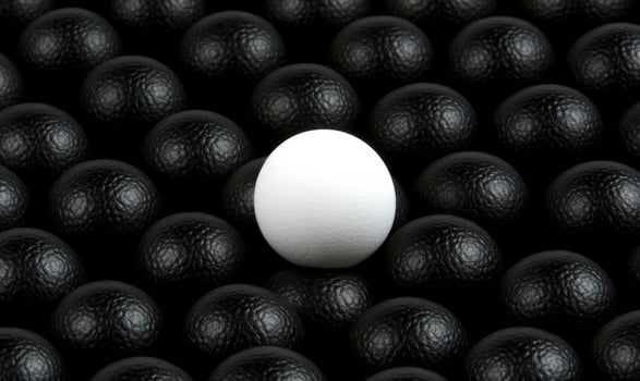 A Single White Sphere Surrounded by Multiple Black Spheres on a Dark Background Representing Individuality and Contrast in Visual Design photo
