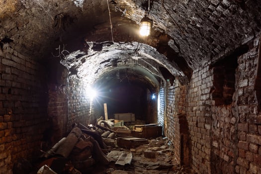 Dark dirty red brick abandoned tunnel.. photo