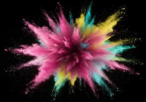 A mesmerizing display of a colorful powder explosion against a dramatic black backdrop. photo