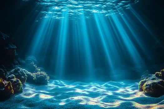 Underwater Tranquility Sunlight Streaming Through Ocean Depths for Nature Inspiration photo