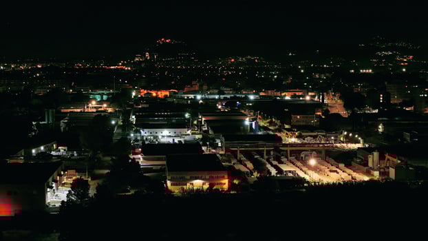 cityscape glowing at night time lapse photo