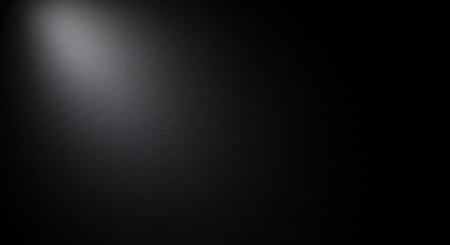 Black background with light shining through it photo