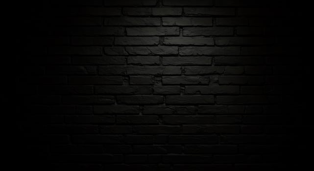 Black brick wall background with light in the dark photo