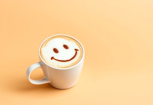 Coffee with a smiley face on top of it photo