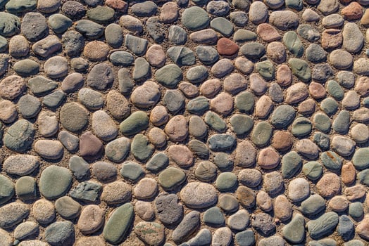 Pebble pavement or wall decoration texture photo