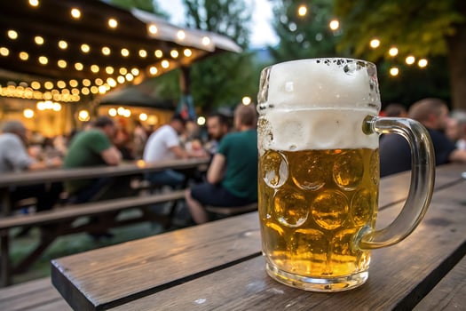 Close-up of Large Beer Mug Filled with Golden Beer photo