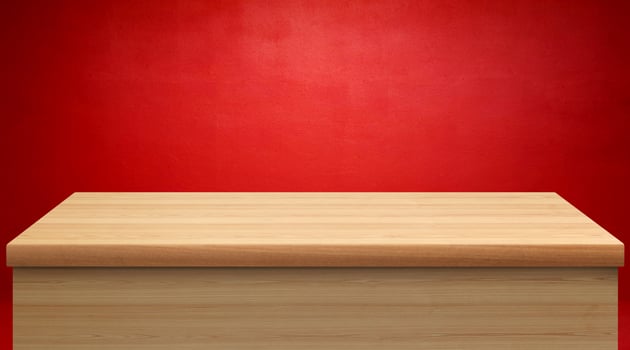 Beautiful and elegant empty wooden table, red wall background photo