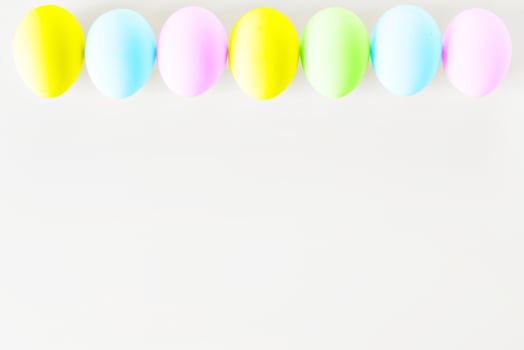 Colorful easter eggs on white background photo