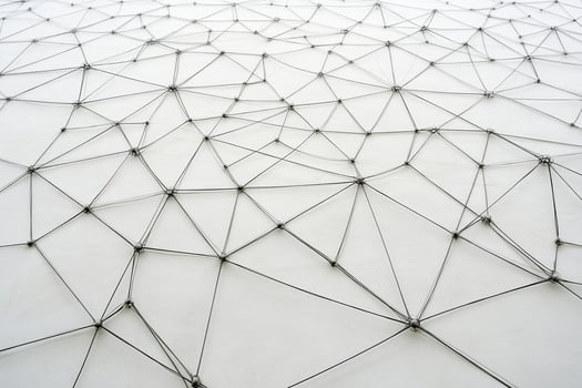A white wall with a lot of wires photo