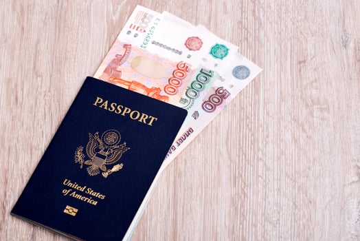 American passport with Russian money photo